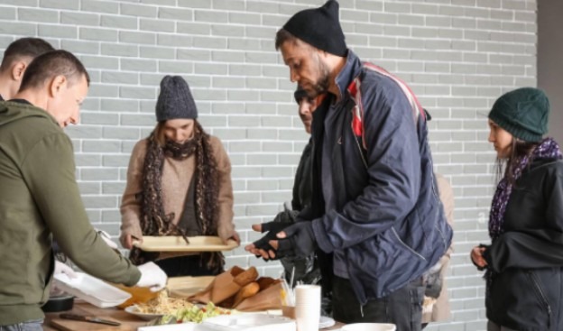 Food insecure individuals being served fresh meals